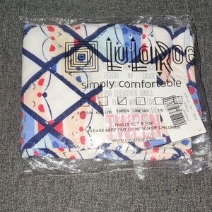 LuLaRoe Blue and Red Santa Patterned Leggings. Tween. NWT